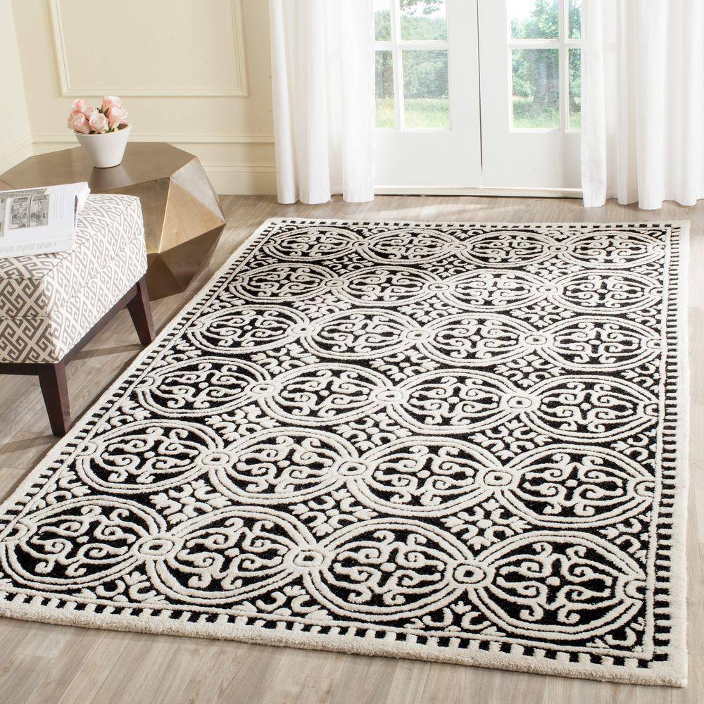 Black and Ivory Hand-Tufted Wool Geometric 9' x 12' Area Rug