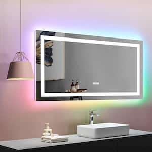 Vanity Trident 55 in. W x 30 in. H Rectangular RBG Frameless LED Wall Mount Bathroom Vanity Mirror with Touch Dimmer