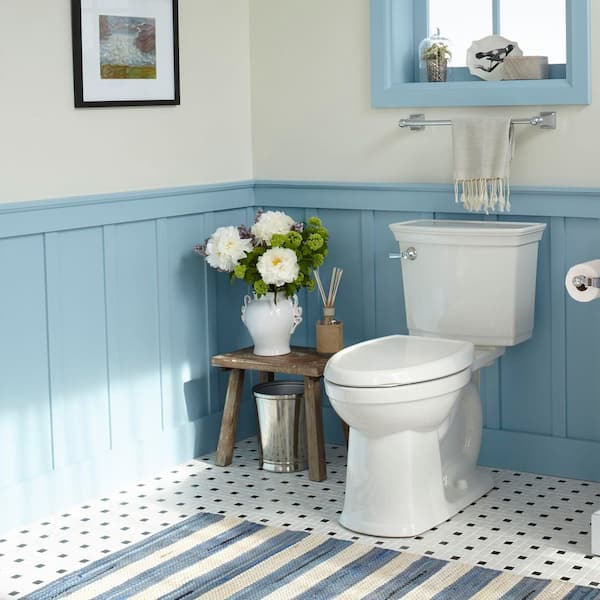 Optum VorMax Two-Piece 1.28 GPF Single Flush Elongated Chair Height Toilet with Slow-Close Seat in White
