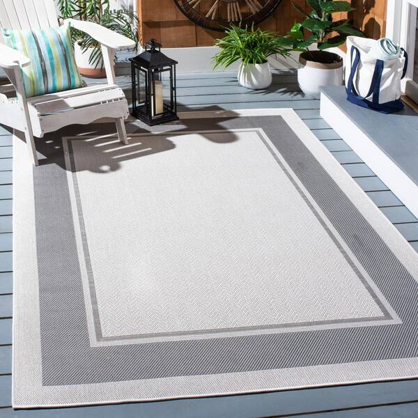 https://images.thdstatic.com/productImages/057d1ce2-0e49-4901-aeed-63d2e03d14ef/svn/ivory-gray-safavieh-outdoor-rugs-msro317f-7sq-e1_600.jpg