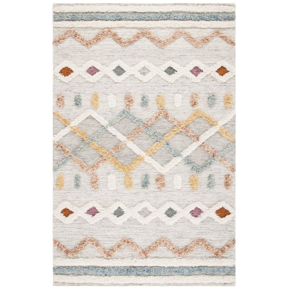 Handmade Ivory Wool Rectangular 6' x 9' Rug