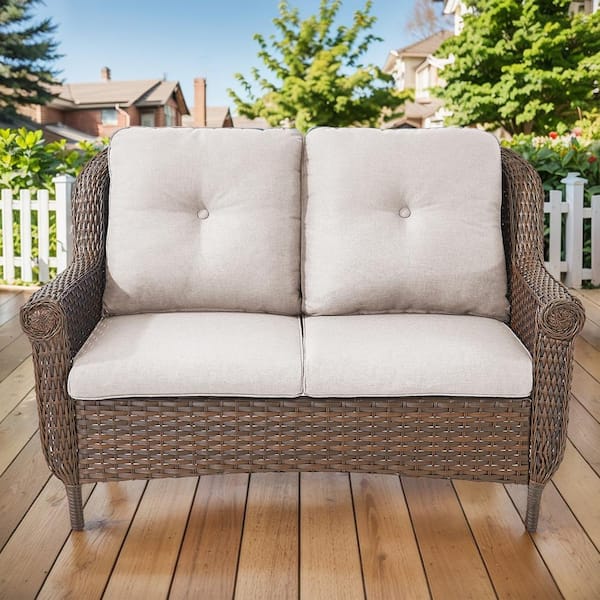 Opohoro Chryswirl Brown Wicker and Metal Frame Outdoor Loveseat with Beige Cushions