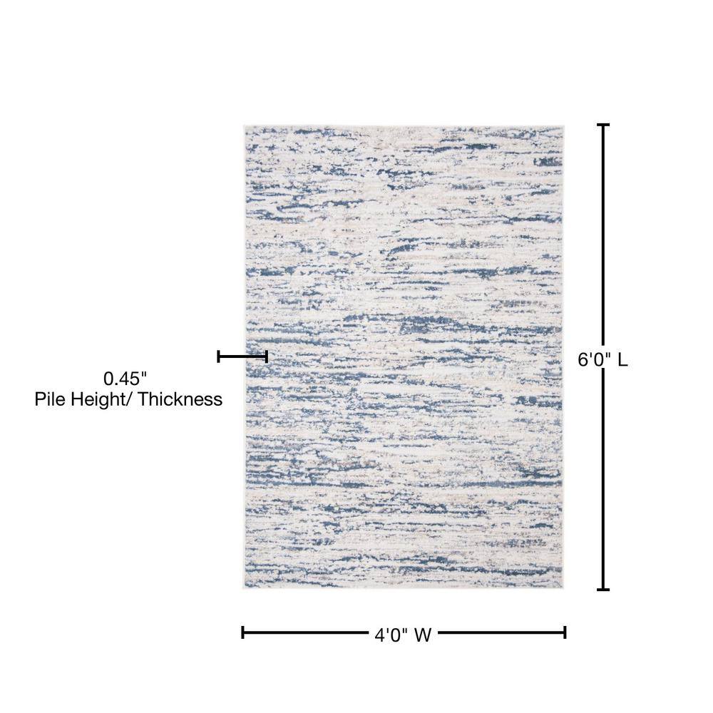 Ivory and Blue Abstract Synthetic 4' x 6' Easy-Care Area Rug