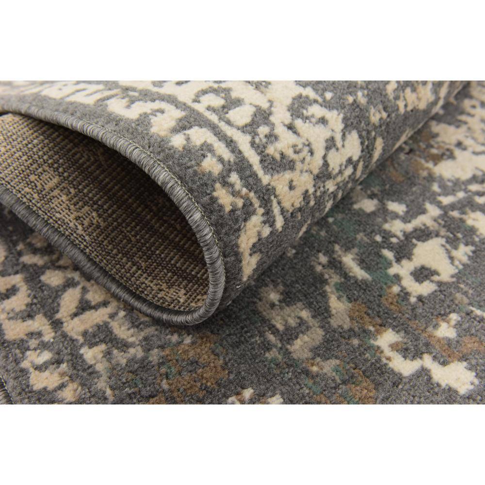 Gray and Beige Abstract 4' x 6' Stain-Resistant Synthetic Rug