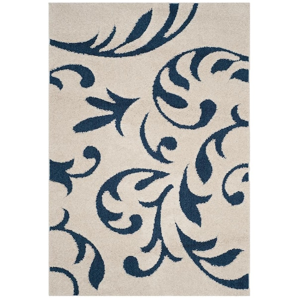 SAFAVIEH Florida Shag Cream/Blue 8 ft. x 10 ft. Solid Floral Area Rug