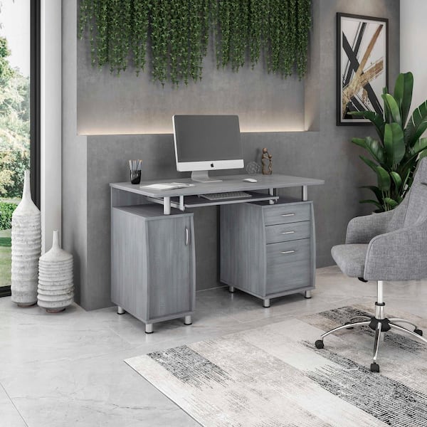 gray computer desk with keyboard tray