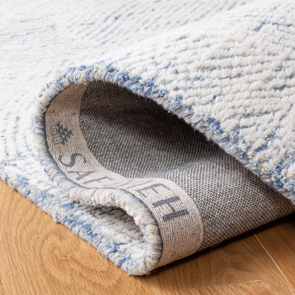 Blue and Ivory Hand-Tufted Wool Area Rug 3' x 5'
