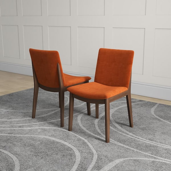 https://images.thdstatic.com/productImages/05ea8541-96f8-428a-9290-d44416328f07/svn/orange-ashcroft-furniture-co-dining-chairs-dchr-vir-vel-org-76_600.jpg