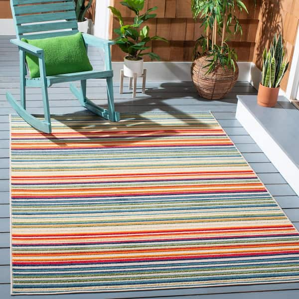 https://images.thdstatic.com/productImages/05f45673-443c-4854-8f2a-8d410564597b/svn/ivory-green-safavieh-outdoor-rugs-cbn323a-5-31_600.jpg