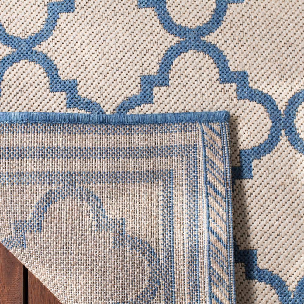 Cream and Blue Geometric Synthetic Indoor/Outdoor Area Rug