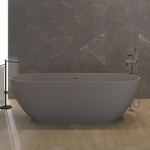 62.9 in. x 29.52 in. Contemporary Oval Solid Surface Soaking Bath Tub Stone Resin Freestanding Bathtub in Matte Gray