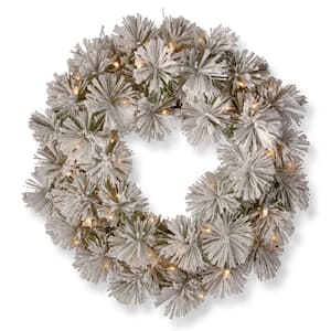 24 in. Snowy Bristle Pine Artificial Wreath with Battery Operated Warm White LED Lights