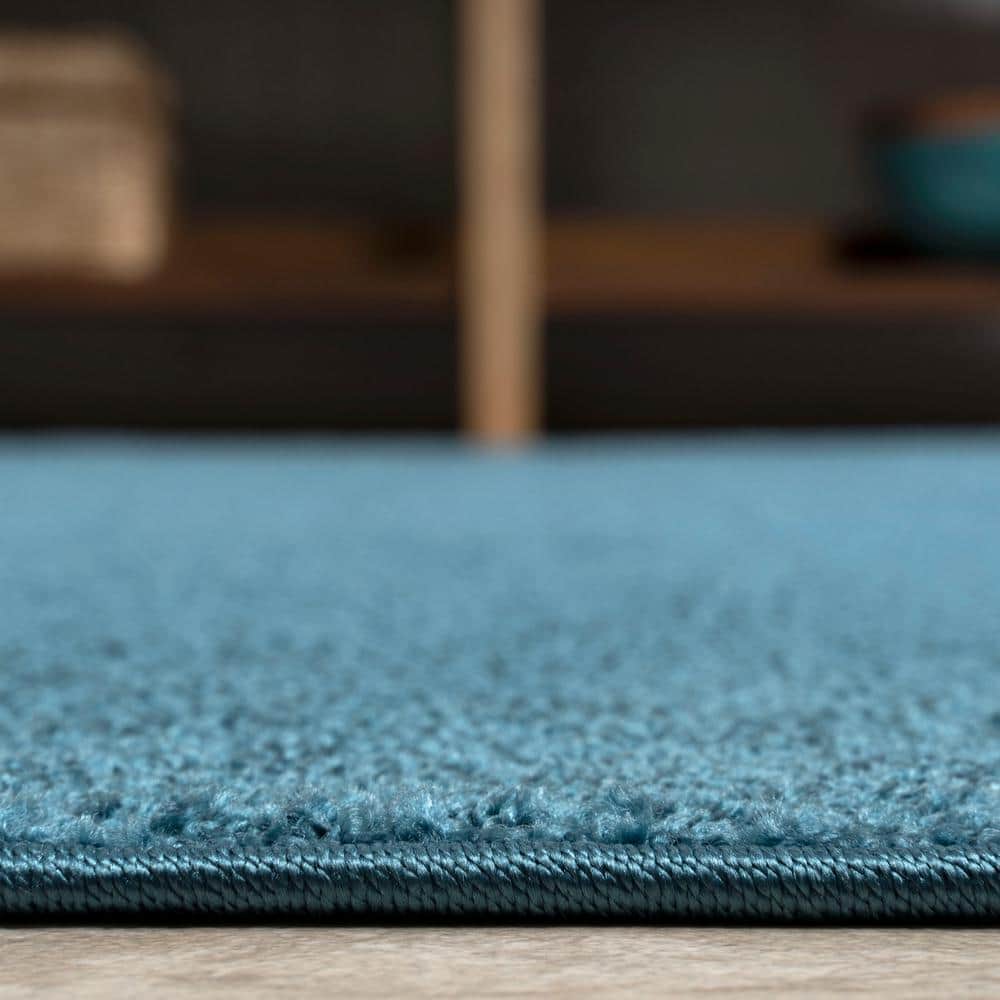 Turquoise Reversible Solid Synthetic Low-Pile Area Rug