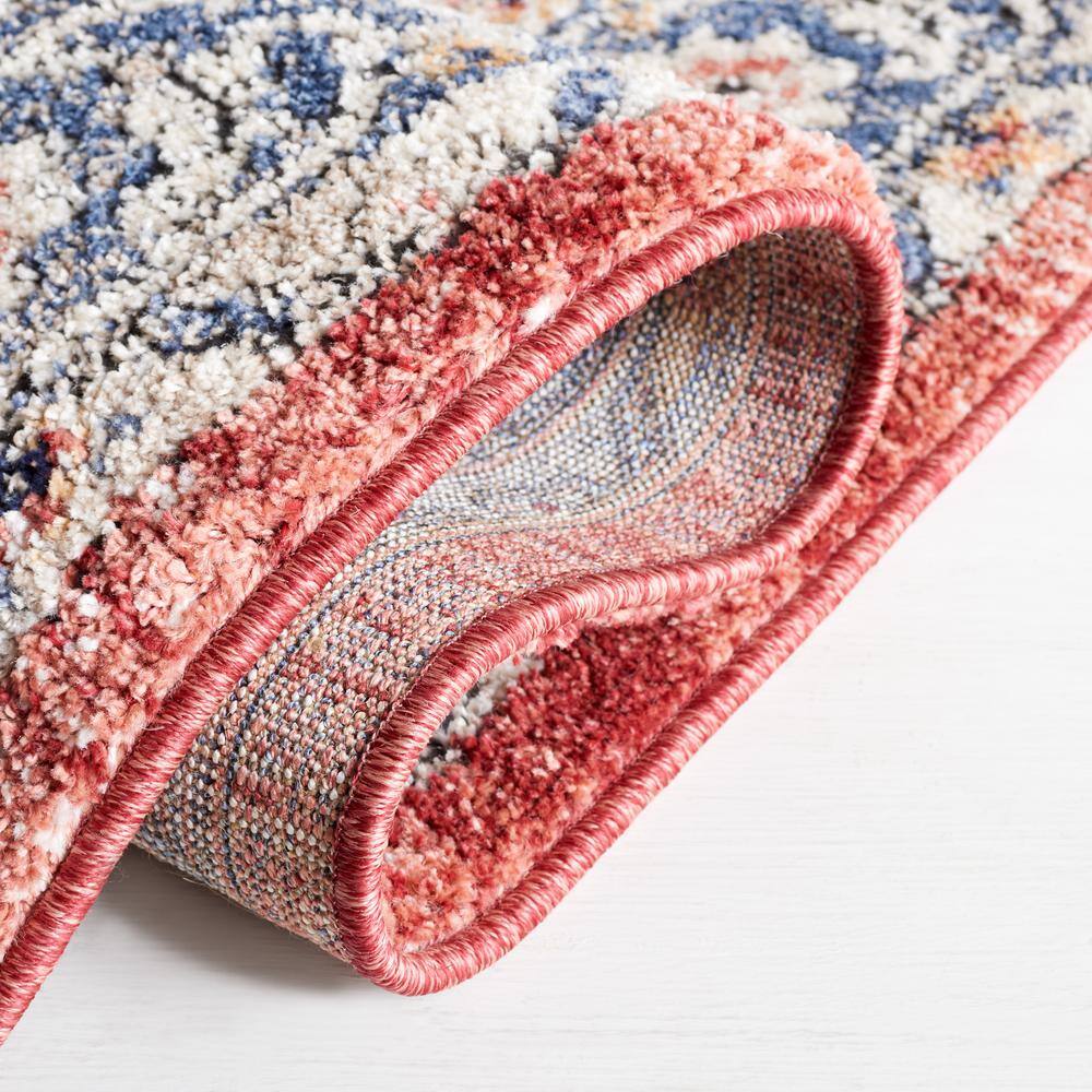 Luna 4'5" x 6'5" Blue and Rust Synthetic Area Rug