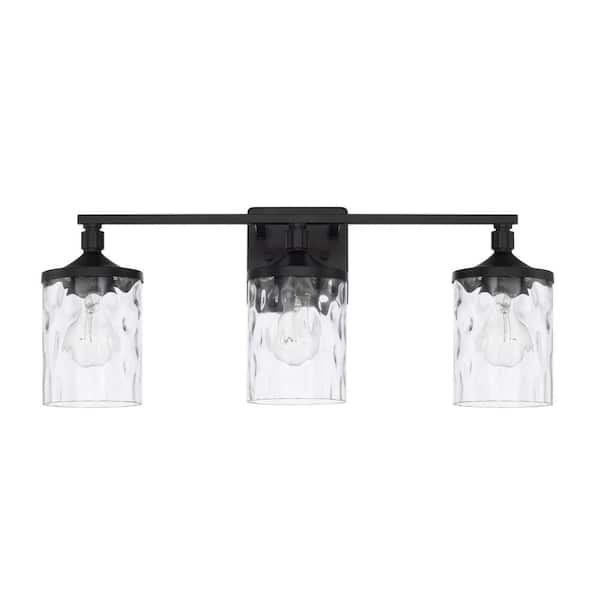 24 in. W x 10 in. H x 7 in. E 3-Light Clear Water Glass Vanity Light in Matte Black