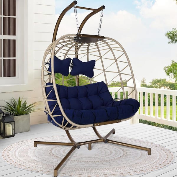 FINCATI 2 Person Outdoor Beige Wicker Swing Egg Chair with Golden Stand and Navy Blue Cushions