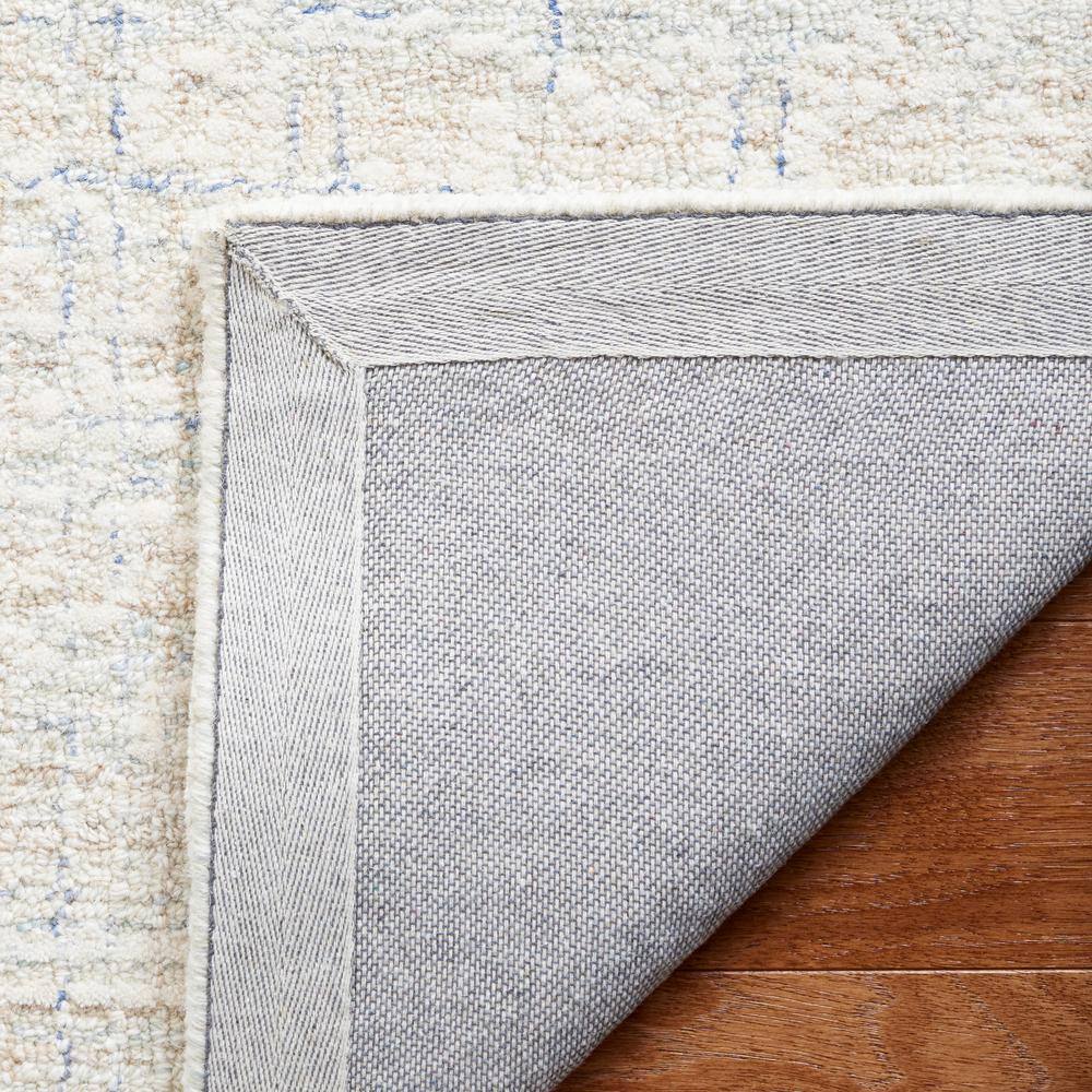 Handmade Blue and Ivory Wool Tufted 8' x 10' Rug