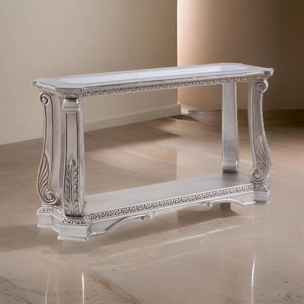 Benjara 54 in. Gold Rectangle Wooden Console Table with Polyresin Engravings and Clear Glass Top