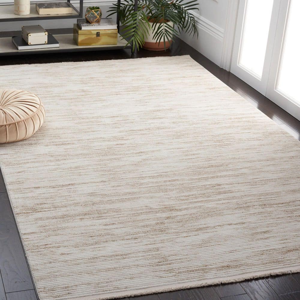 Ivory Beige 9' x 12' Synthetic Easy Care Area Rug