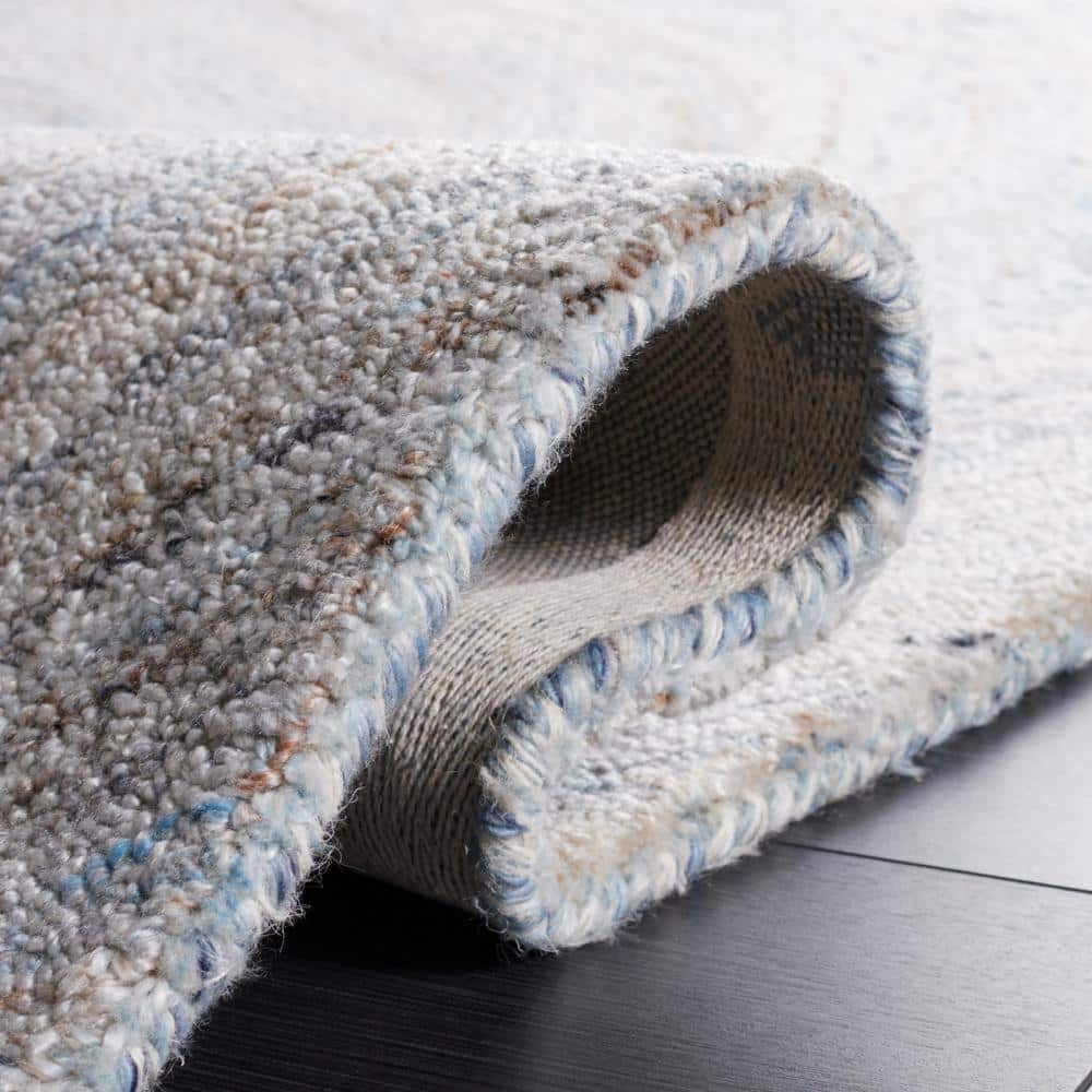Blue and Beige Abstract Wool 8' x 10' Area Rug