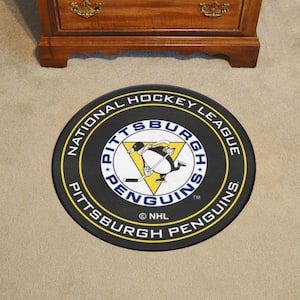 NHL Retro Pittsburgh Penguins Black 2 ft. Round Hockey Puck Area Rug