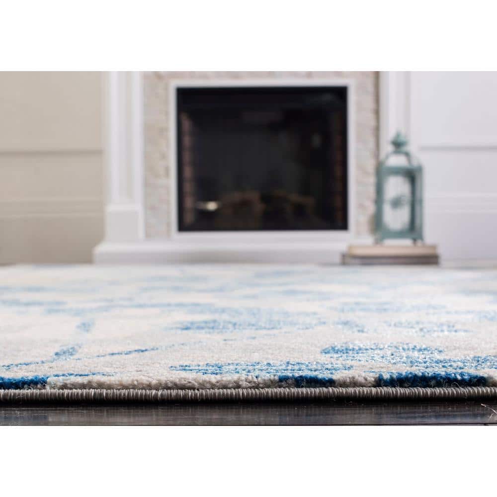 Elegant Gray Floral 9' x 12' Synthetic Easy-Care Area Rug