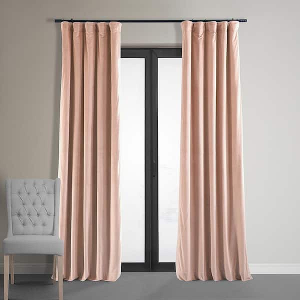 Exclusive Fabrics & Furnishings Rosey Dawn Velvet Solid 50 in. W x 84 in. L Lined Rod Pocket Blackout Curtain