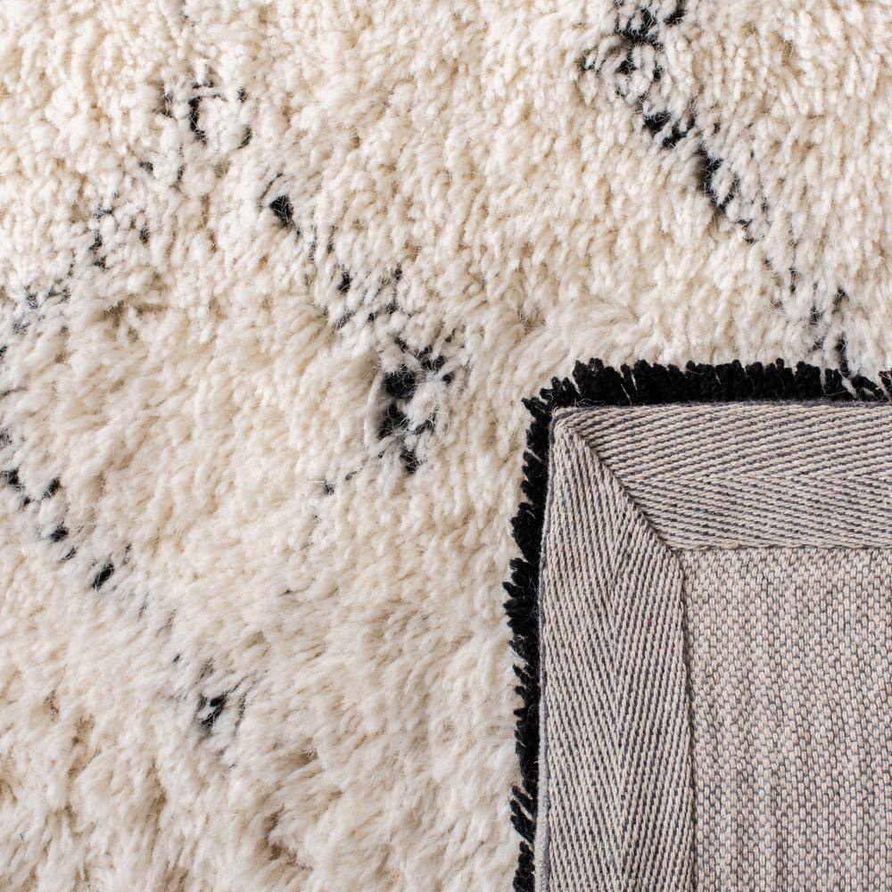 Ivory and Black Geometric Wool Shag Area Rug 3' x 5'