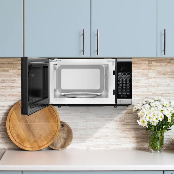https://images.thdstatic.com/productImages/06fa403b-ae6f-4512-8f0d-a578059750a2/svn/stainless-steel-danby-countertop-microwaves-ddmw007501g1-77_600.jpg