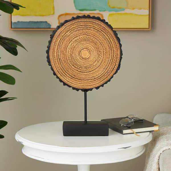 Litton Lane 17 in. Brown Metal Carved Circular Tribal Sculpture with Black Stand and Wavy Edge