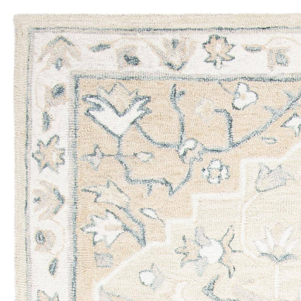Handmade Beige and Ivory Wool Tufted Area Rug