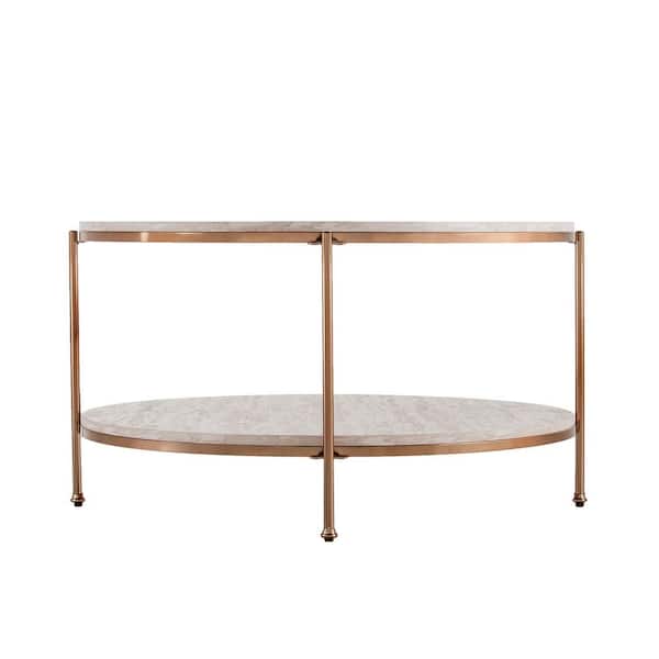 Southern Enterprises Kaitlyn 34 in. Gold Medium Round Resin Coffee Table with Shelf