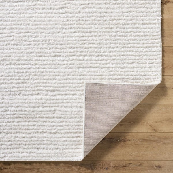 Nomadic Cream Modern Solid Color 7 ft. x 10 ft. Area Rug
