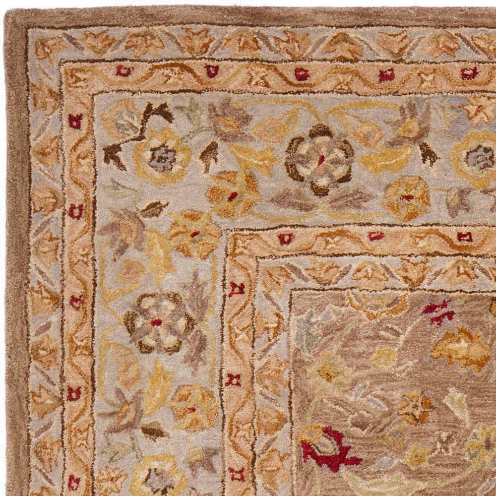 Handmade Tufted Floral Wool 8' x 10' Tan/Ivory Rug