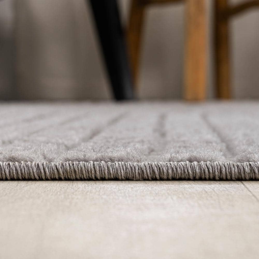 Gray and Ivory Geometric 4' x 6' Synthetic Area Rug