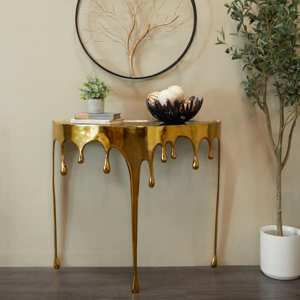 Litton Lane 37 in. x 32 in. Gold Half-Moon Glass Aluminum Drip Console Table with Melting Designed Legs and Shaded Glass Top