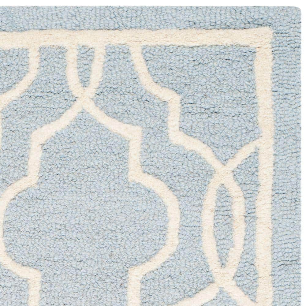 Ivory and Light Blue Hand-Tufted Wool Area Rug