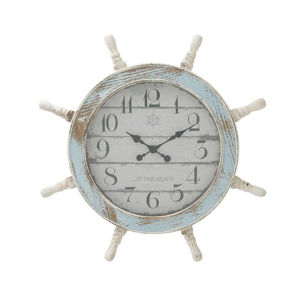 https://images.thdstatic.com/productImages/075fd9d8-13a5-4015-8455-6f6f6130c768/svn/blue-litton-lane-wall-clocks-18196-64_1000.jpg