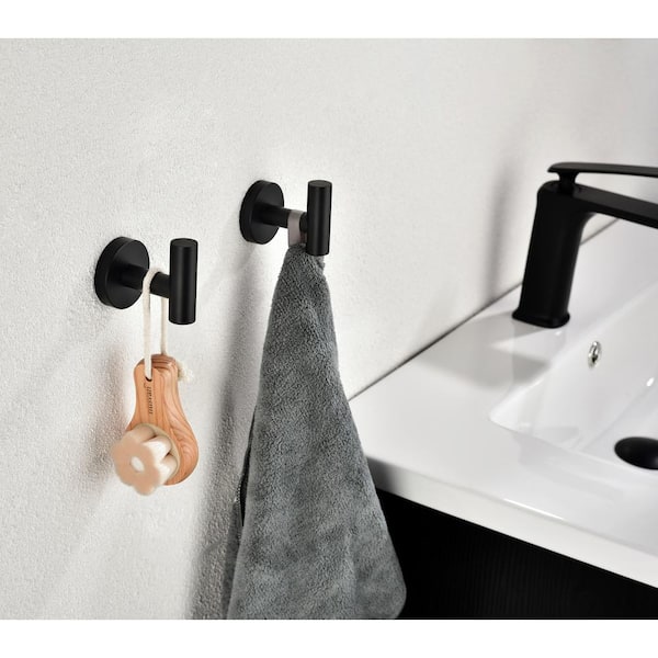 https://images.thdstatic.com/productImages/07689214-7380-41fa-827a-e39faa9afb8c/svn/matte-black-toolkiss-bathroom-hardware-sets-thg08mb-fa_600.jpg