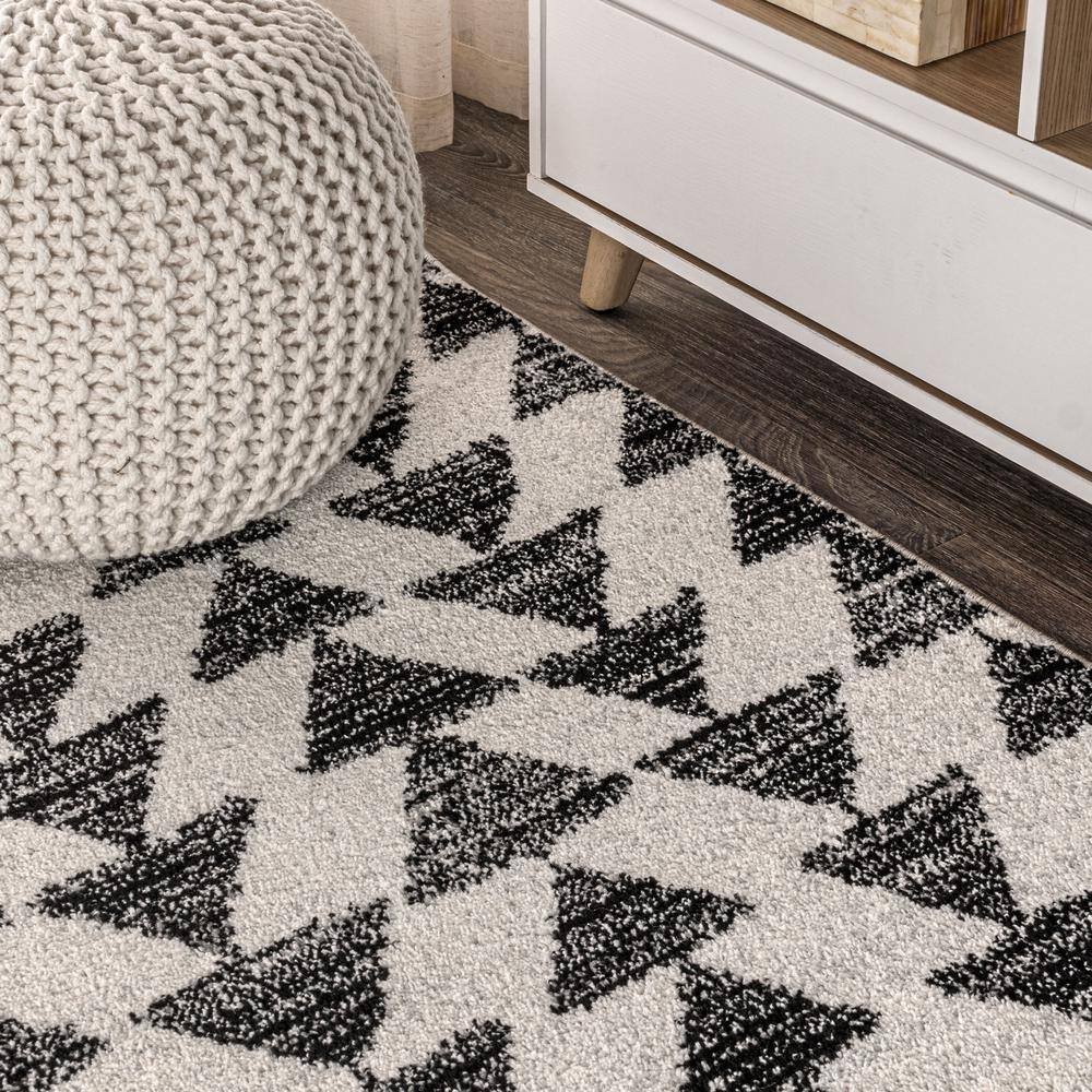 Aisha Cream and Black Geometric Synthetic Area Rug