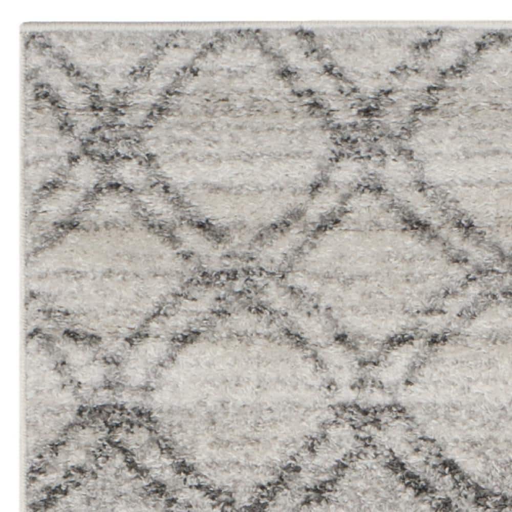 Ivory and Charcoal Synthetic Rectangle Area Rug