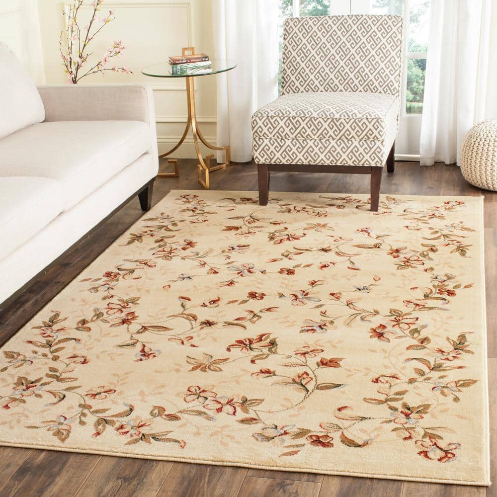 Ivory Elegance 59'' Tufted Round Floral Synthetic Area Rug