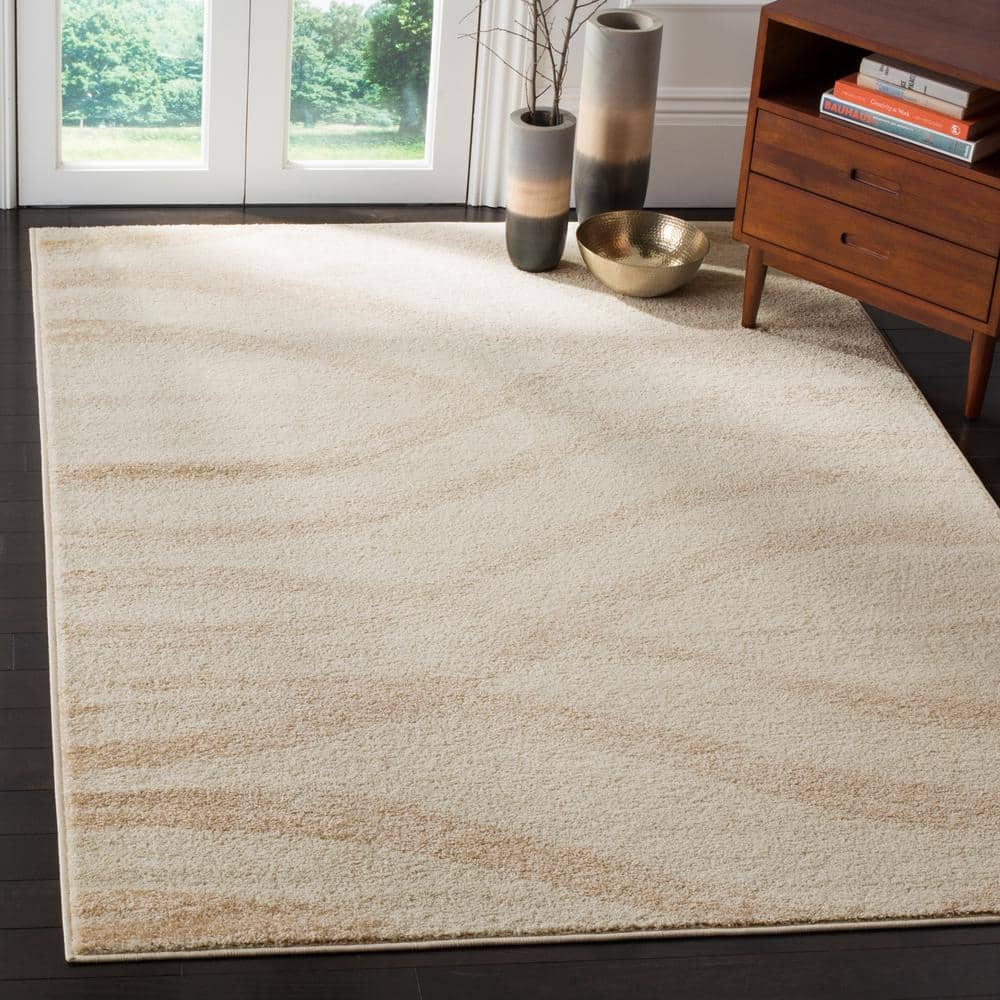 Cream and Champagne Abstract Rectangular 9' x 12' Area Rug
