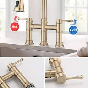 Double Handle Bridge Kitchen Faucet with Pull-Down Spray Head in Brushed Gold