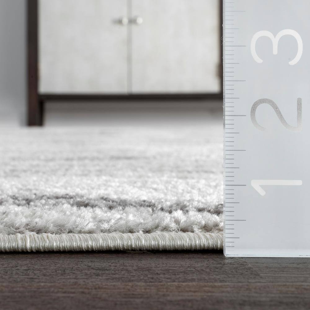 Gray Oval Reversible Stain-Resistant Synthetic Area Rug