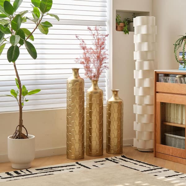 25 in. /29 in. /34 in. White Metal Vase Trio, Glam Home Decor Cylinder Floor Vases w/ Gold Accents & Triangle Embossing