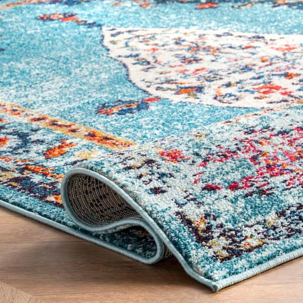 https://images.thdstatic.com/productImages/0797ae6c-443a-4a15-b646-d69e95d69712/svn/aqua-nuloom-area-rugs-kkcb26a-710011-4f_600.jpg