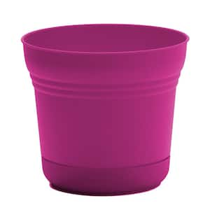 Saturn 12.25 in. L x 14.5 in. W x 10.75 in. H 12 qts. Fuchsia Indoor/Outdoor Plastic Planter with Saucer