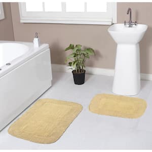 https://images.thdstatic.com/productImages/07a5c8e3-c79d-4a63-bad8-d439212c922c/svn/yellow-bathroom-rugs-bath-mats-bra2pc1721ye-64_300.jpg