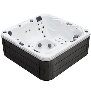 Surfaces 4-Person 36-Jet 72-Port 240 V Acrylic Lounger Hot Tub, Bluetooth Stereo, LED Water Columns